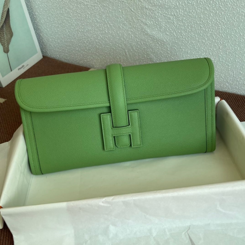 H**mes clutch bags